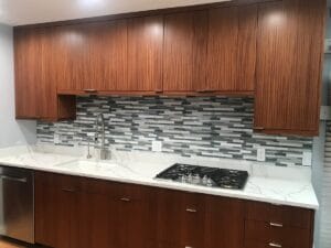 Stylish Kitchen Remodel with White Countertops and Horizontal Backsplash