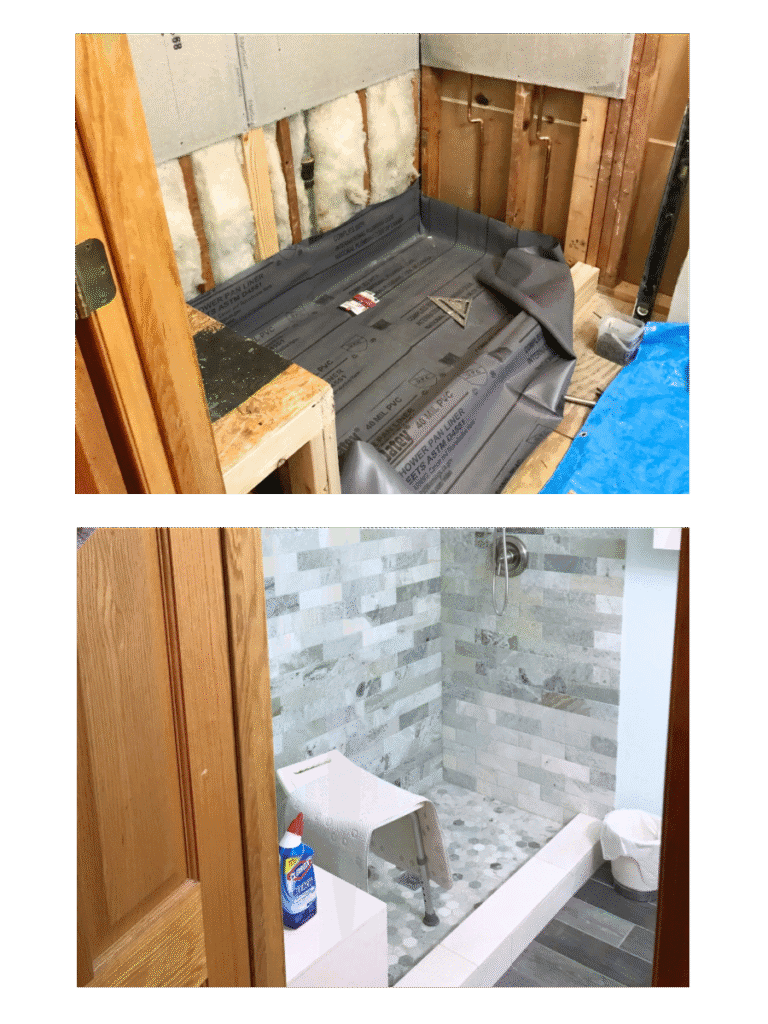 Shower area during renovation with exposed framing, insulation, and shower pan liner installed.