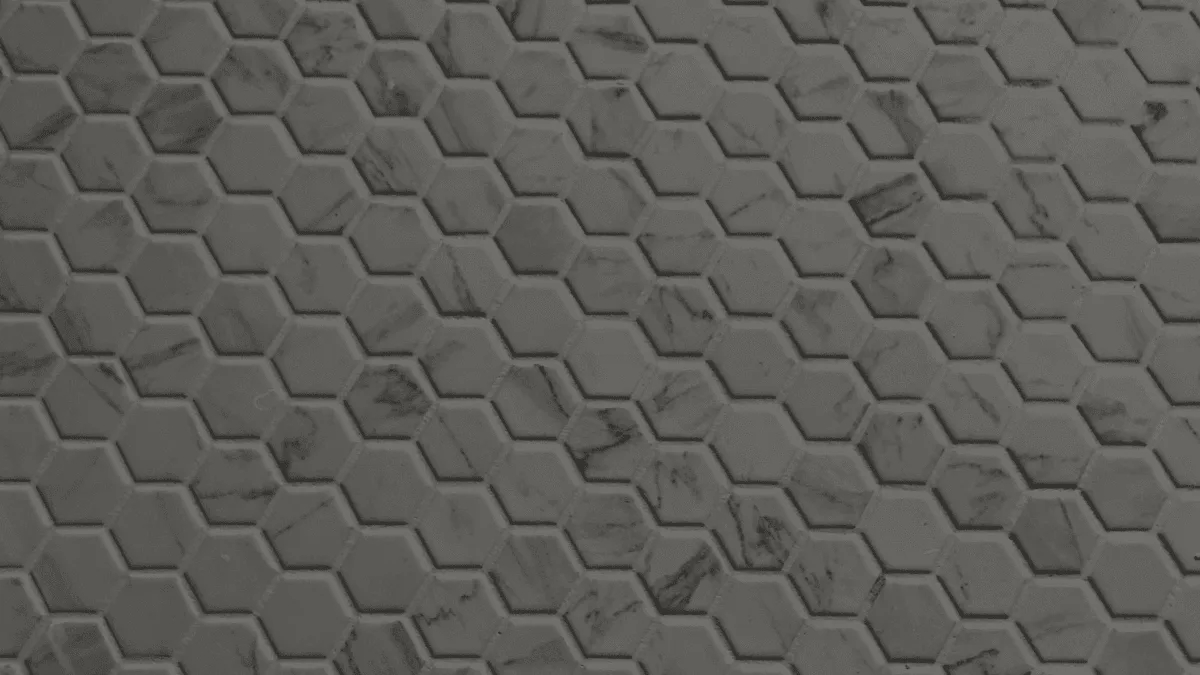 Close-up of marble hexagon tiles with flawless grout lines and perfect spacing.
